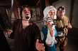 Photo: Laughing Lady with Sword on Man Laughing Lady with Sword on Man