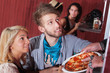 Young Couple Ordering Pizza