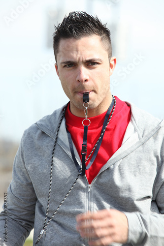Photo: Referee with whistle Referee with whistle