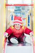Beautiful happy kid in the red jacket
