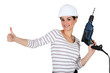 Tradeswoman giving the thumb's up