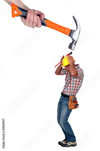 Photo: Builder being attacked Builder being attacked