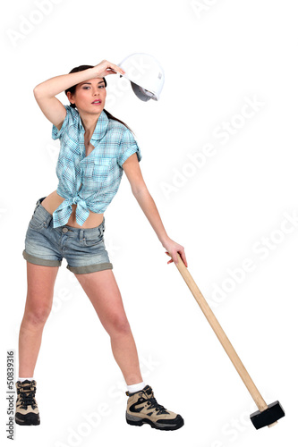 Photo: Tired female construction worker Tired female construction worker