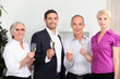 a family toasting with sparkling wine