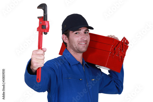 Photo: Worker with a toolbox and wrench Worker with a toolbox and wrench
