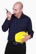 Engineer screaming into a walkie-talkie