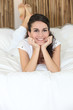 Girl lying on her bed
