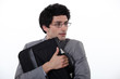 businessman holding a precious briefcase