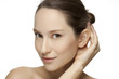 Beautiful young woman with clean skin of the face.
