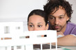 Couple looking at model housing