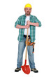 Artisan stood with shovel