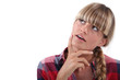Blond woman having a long hard think