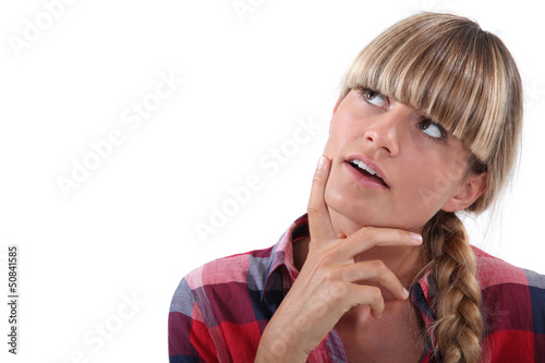 Photo: Blond woman having a long hard think Blond woman having a long hard think