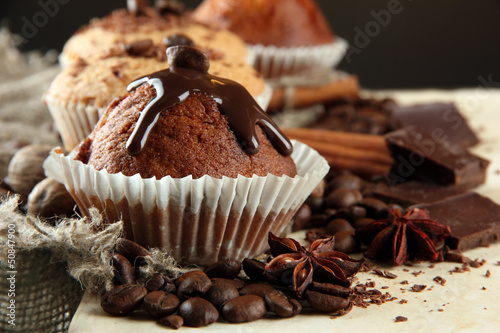 Photo: tasty muffin cakes with chocolate, spices and coffee seeds, tasty muffin cakes with chocolate, spices and coffee seeds,
