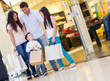 Family with shopping bags