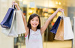 Girl holding shopping bags