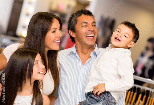 Photo: Happy family shopping Happy family shopping