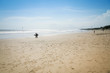 surfers on kuta beach bali indonesia