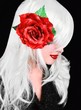 Foto: Pretty woman with red rose flower hair clip Pretty woman with red rose flower hair clip