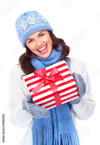 Photo: Beautiful christmas girl with gifts. Beautiful christmas girl with gifts.