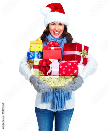 Photo: Santa helper Christmas girl with a presents. Santa helper Christmas girl with a presents.