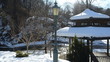 wooden bower roof snow retro lighting river bank winter park