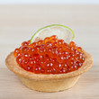 Tartlet with red caviar and lime