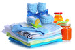 Pile of baby clothes isolated on white