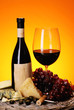 Refined still life of wine, cheese and grapes