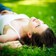 Close-up portrait of an attractive young woman outdoors