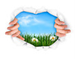 Nature background with hands ripping a paper. Vector