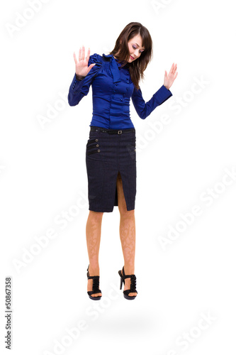 Photo: Jumping business woman. Jumping business woman.