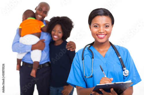 Photo: female african american nurse with family patients female african american nurse with family patients