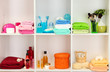 Bath accessories on shelfs in bathroom