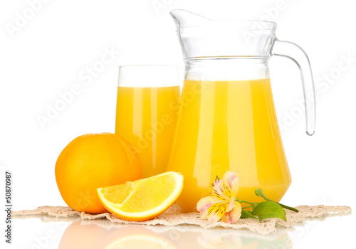 Photo: Full glass and jug of orange juice and oranges isolated on Full glass and jug of orange juice and oranges isolated on
