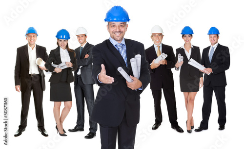 Photo: Portrait of happy architect and his team Portrait of happy architect and his team