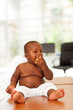 Photo: african baby boy eating apple african baby boy eating apple