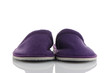 A pair of purple slippers