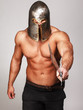 Warrior is pointing with his sword on someone