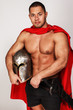 Brave warrior with helmet in his hands