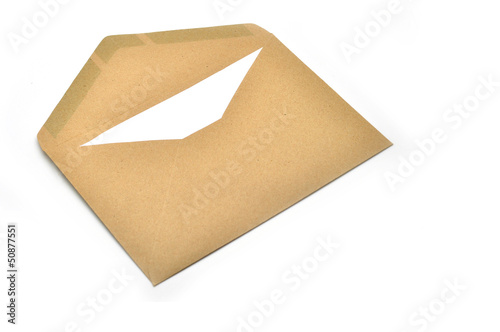 Photo: Opened brown envelope with paper Opened brown envelope with paper