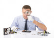 Hardware repairman with a magnifying glass on white