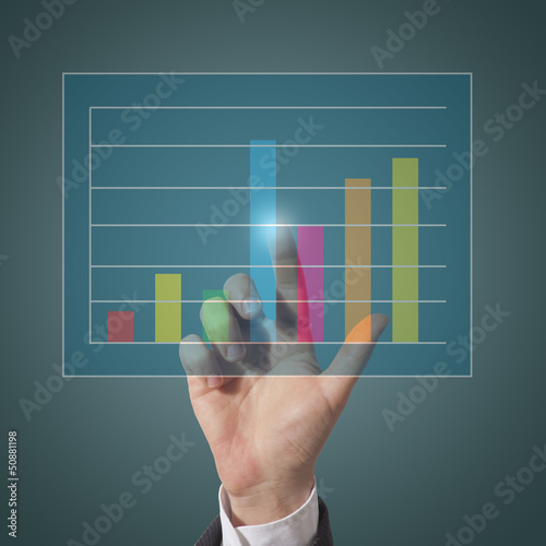 Photo: businessman touch graph businessman touch graph