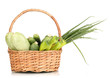 fresh green vegetables in basket isolated on white