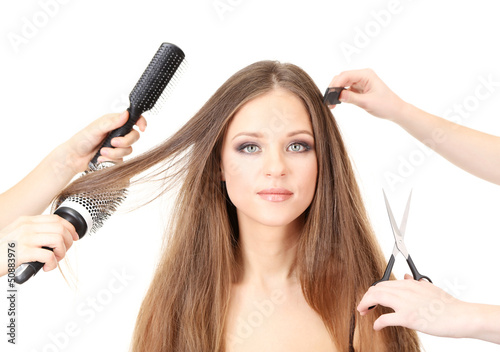 Photo: Woman with long hair in beauty salon, isolated on white Woman with long hair in beauty salon, isolated on white