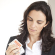 Businessfrau mit Tabletten