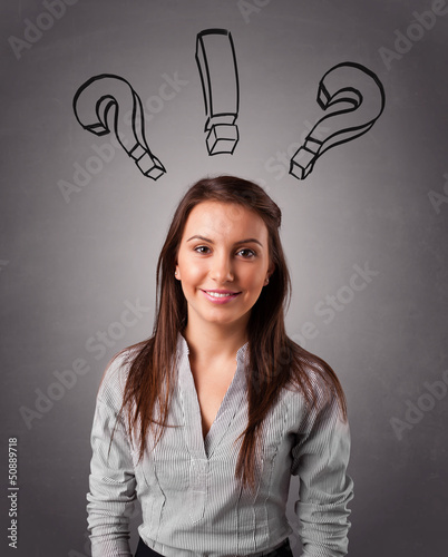 Photo: Young lady thinking with question marks overhead Young lady thinking with question marks overhead