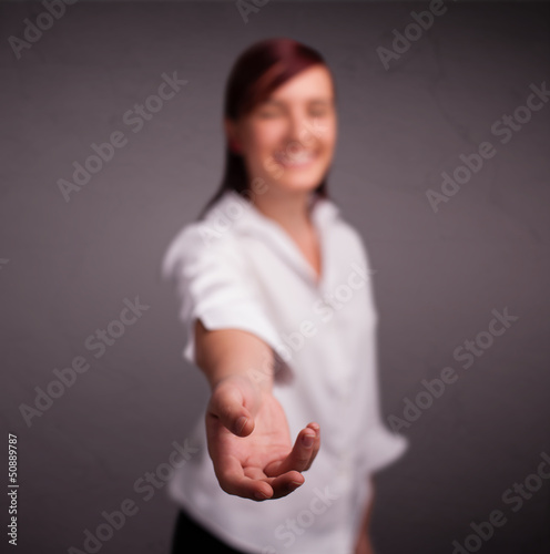 Photo: Pretty girl holding something Pretty girl holding something