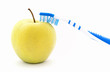 Apple and toothbrush