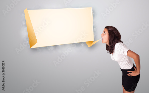 Photo: young woman gesturing with modern origami copy space young woman gesturing with modern origami copy space